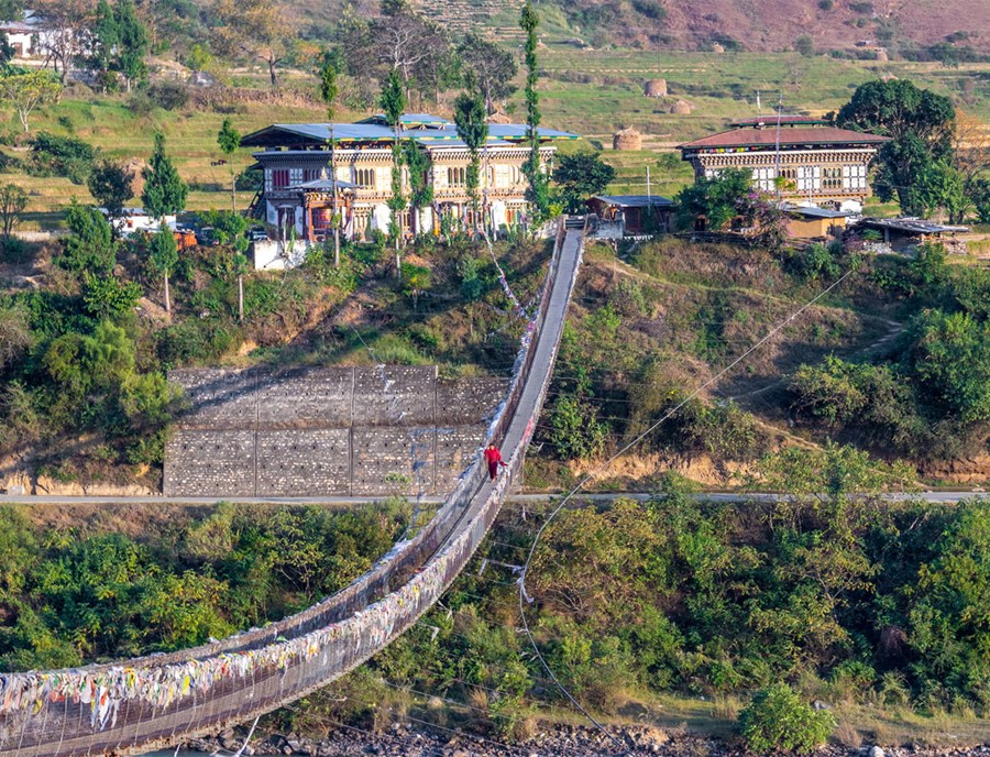 Pho Chhu Suspension Bridge Floating Above Tranquil Punakha River