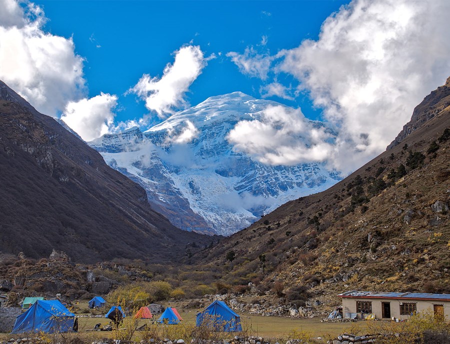 Campsite Nestled Among Bhutan’S Breathtaking Himalayan Landscapes