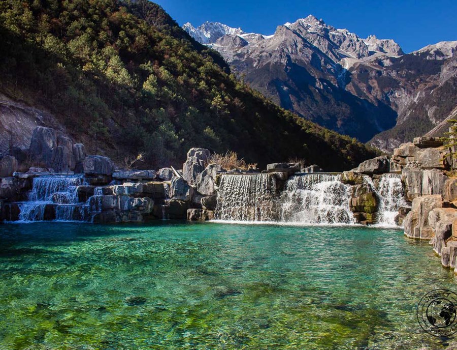 The Turquoise Waters Of Blue Moon Valley, Set Beneath The Peaks Of Jade Dragon Snow Mountain