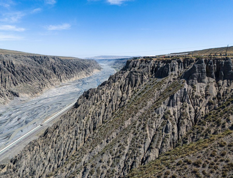 Marvel At The Dramatic Cliffs And Sculpted Landscapes Of Dushanzi Grand Canyon In Xinjiang