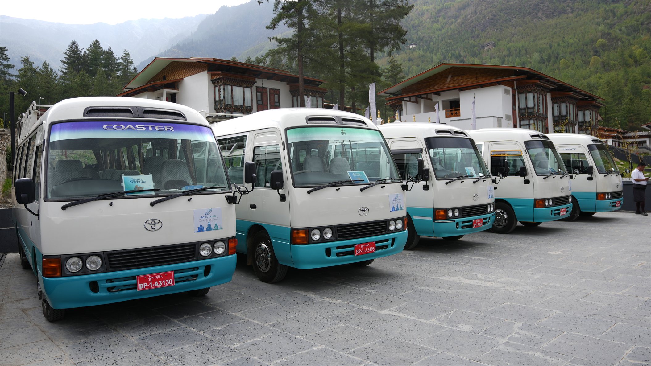 Comfortable coaster rides through the scenic landscapes of Bhutan