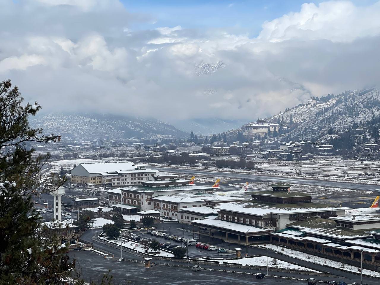 Winter blankets Paro airport in peaceful mountain scenery