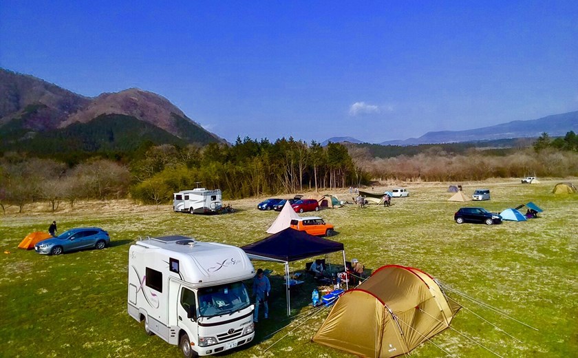 Japan campervan parked at a campsite surrounded by nature