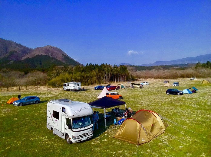 Japan campervan parked at a campsite surrounded by nature