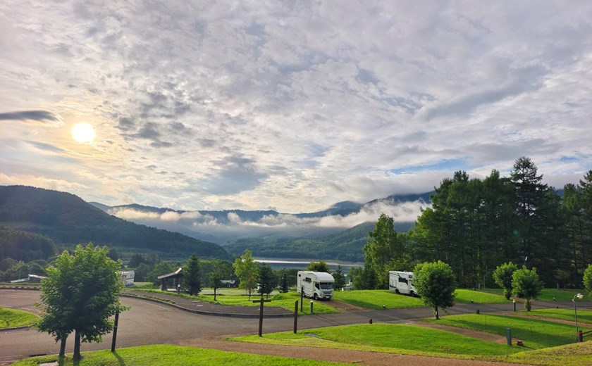 Campervan in Japan with a breathtaking sunrise or sunset backdrop