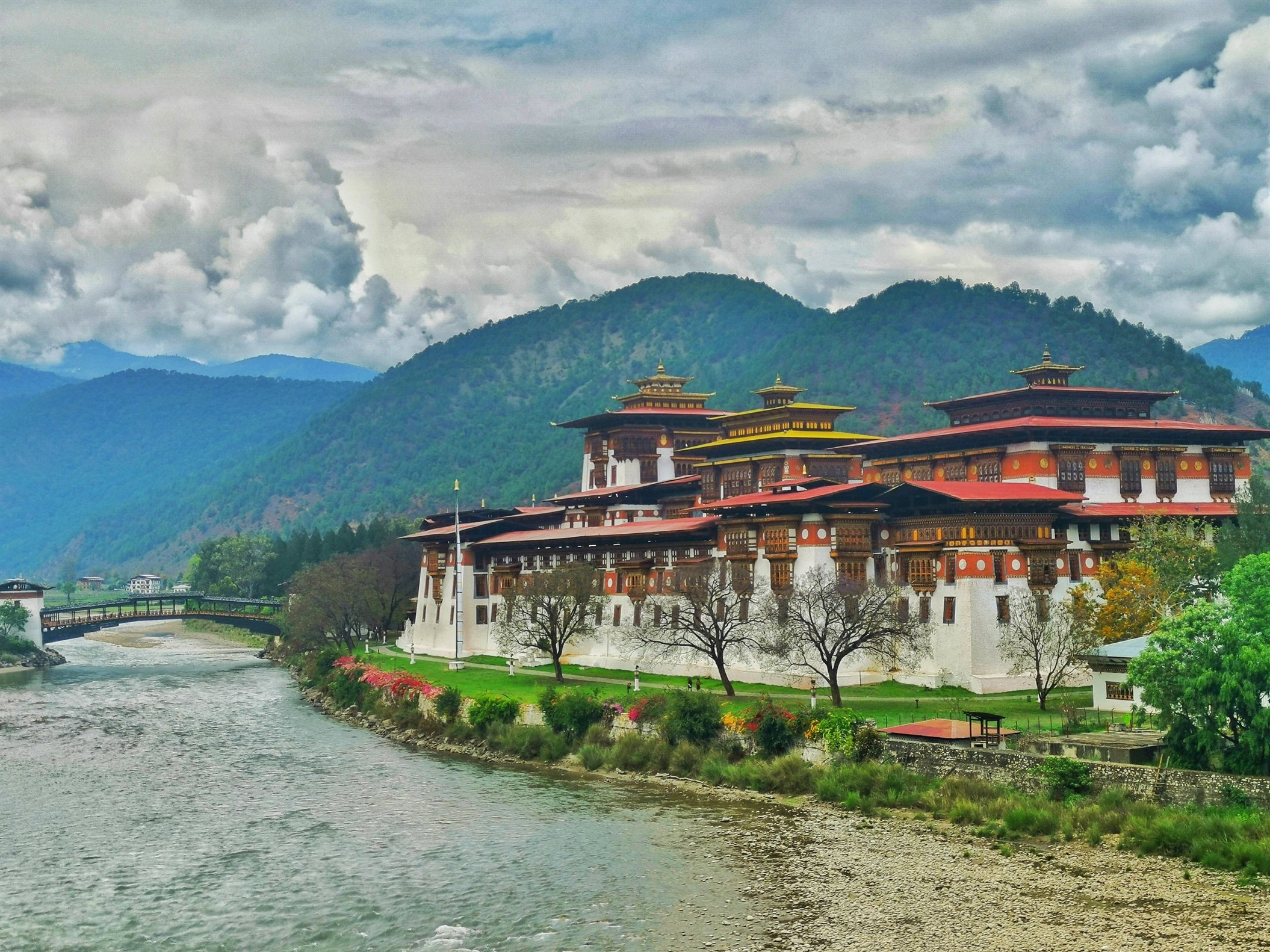 Punakha Dzong stands majestically between two rivers and forested hills