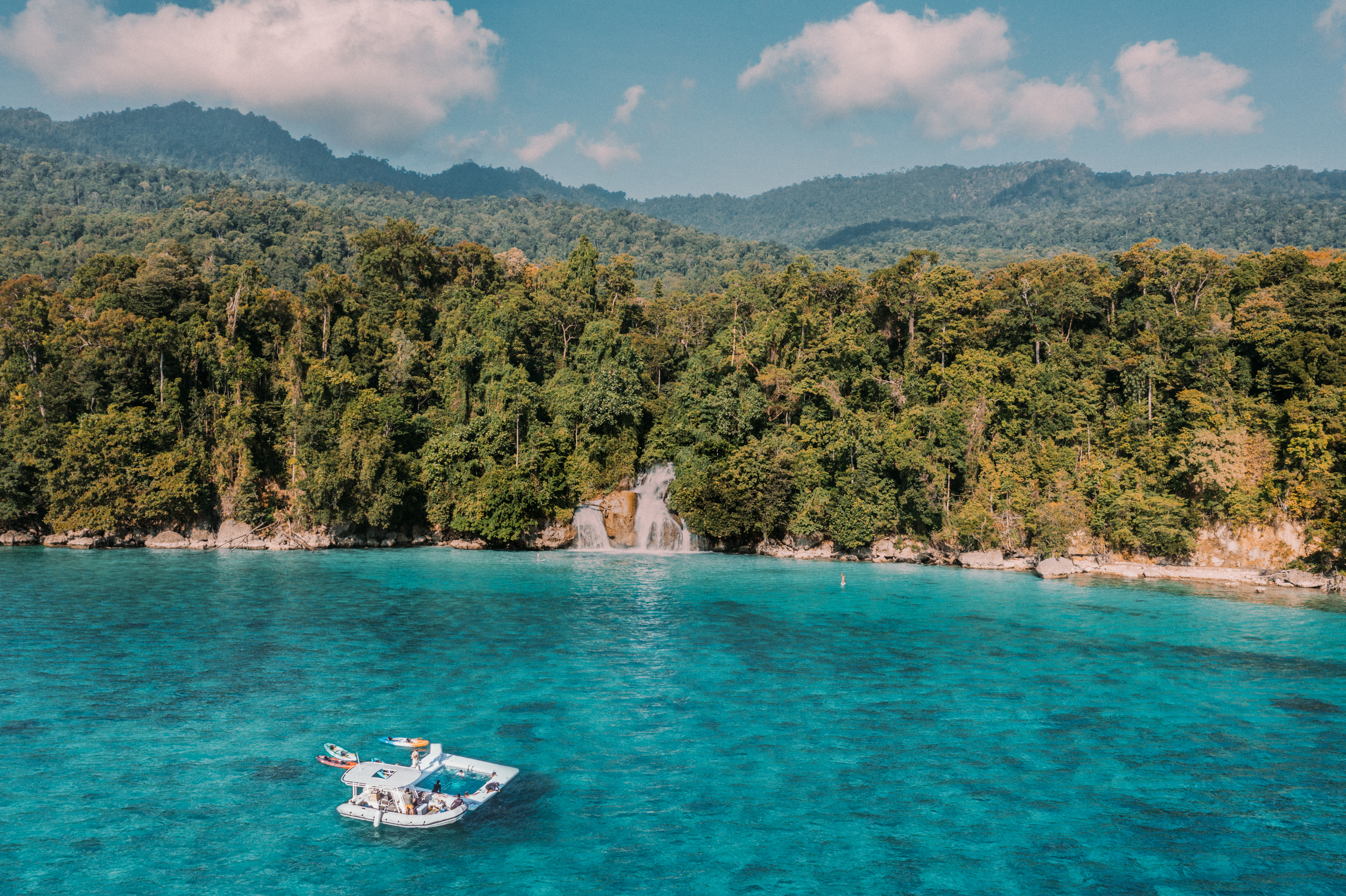 Kayaking through Balbulol’s lagoon surrounded by towering karst formations on Day 8.