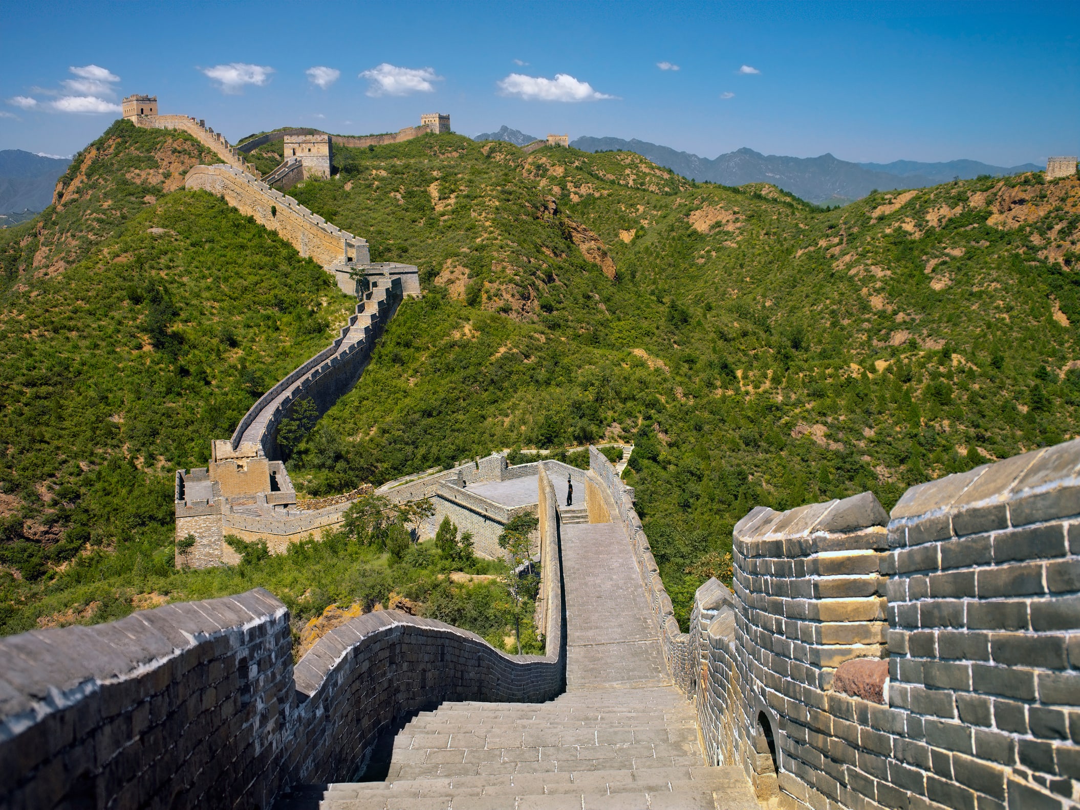 Walk the Great Wall through dramatic mountain landscapes and ancient history