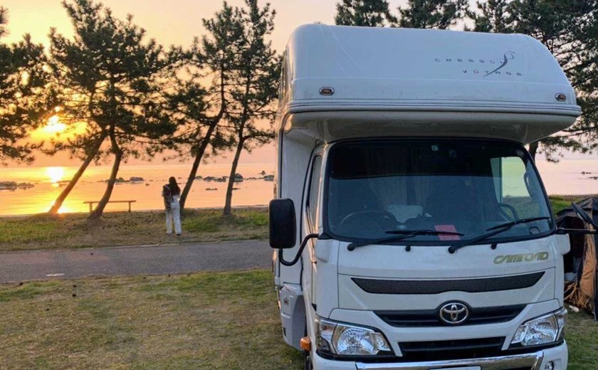 Osaka campervan parked with a scenic sunset view
