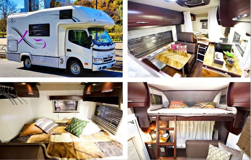 Interior of a middle-class campervan in Osaka, Japan, showing seating, kitchen, and sleeping arrangements.