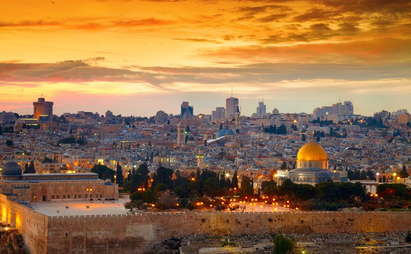 Golden hour over Jerusalem’s Old City, where history glows beneath a fiery sky
