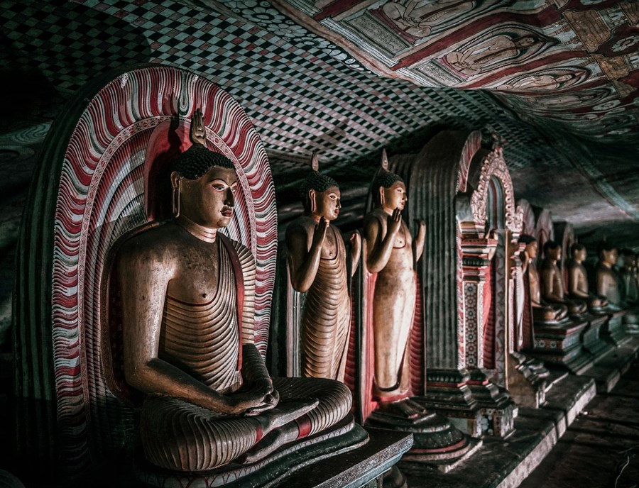 Step inside Dambulla Cave Temple to discover serene Buddha statues and colourful murals beneath ancient rock ceilings.jpg