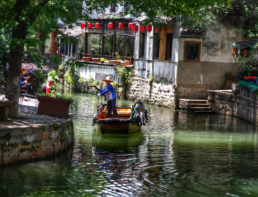 Explore ancient canals, stone bridges, historic architecture, and enjoy a traditional boat ride at Tongli water town.jpg