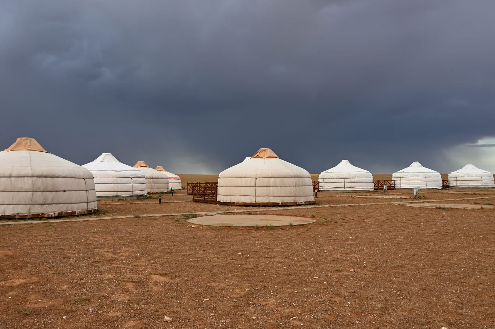 Mongolian Ger Camp Resting Peacefully Beneath Endless Steppe Skies