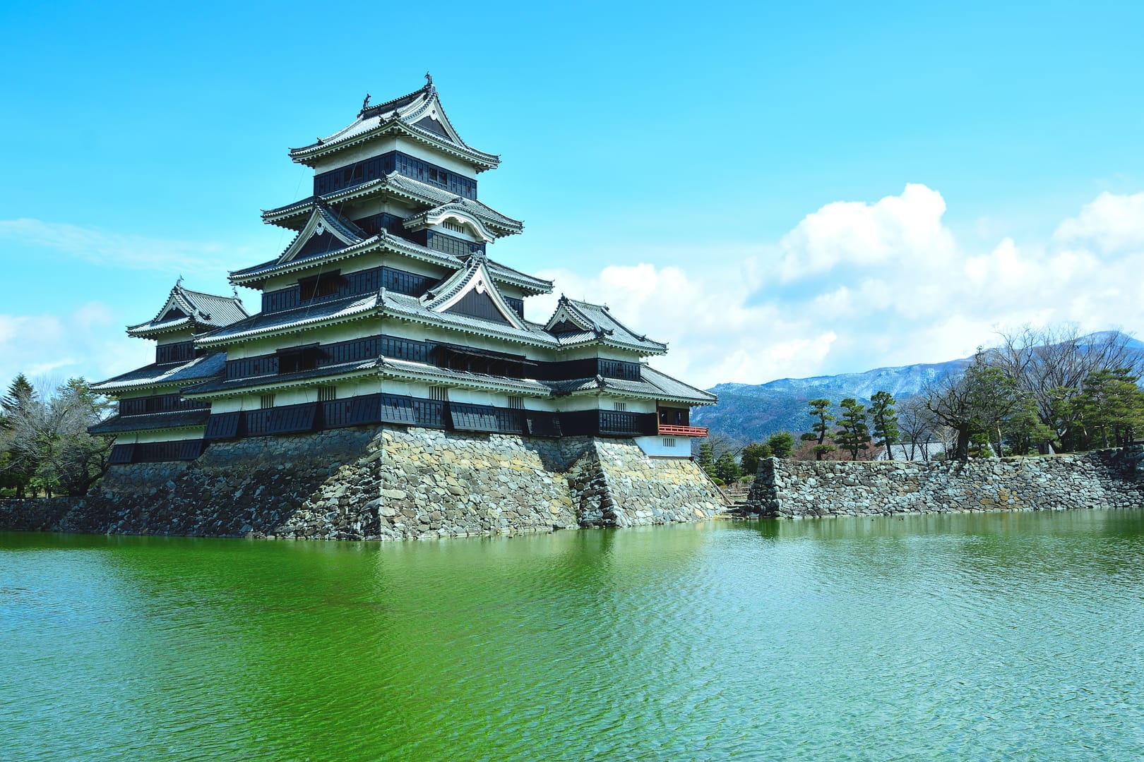 Matsumoto Castle Framed By The Majestic Japanese Alps