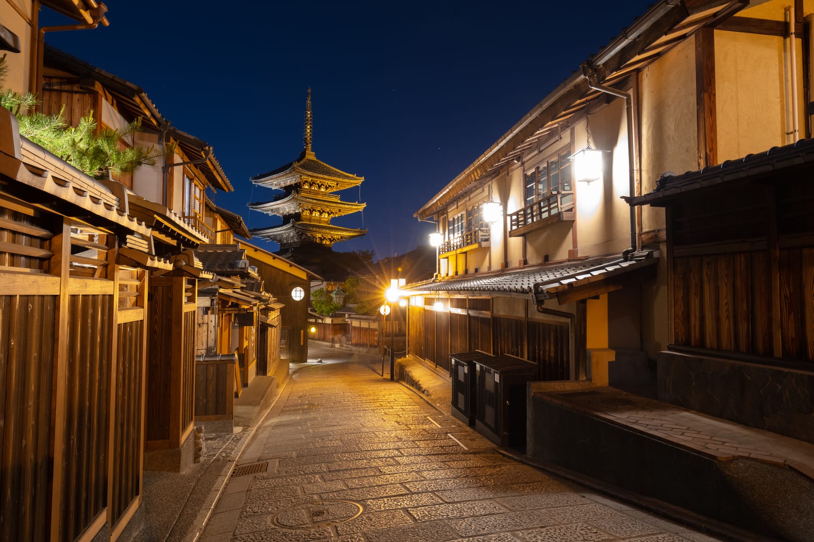 Yasaka Pagoda Glowing Above Kyoto Streets After Sunset
