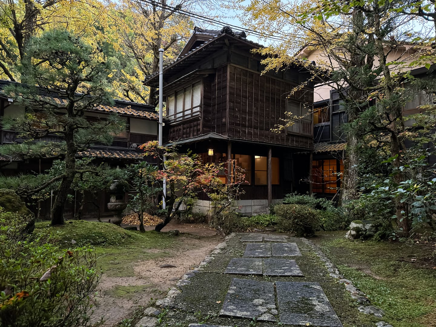 Traditional Ryokan Welcoming Travellers Into An Authentic Japanese Stay